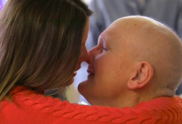 Paul and Rebecca kissing